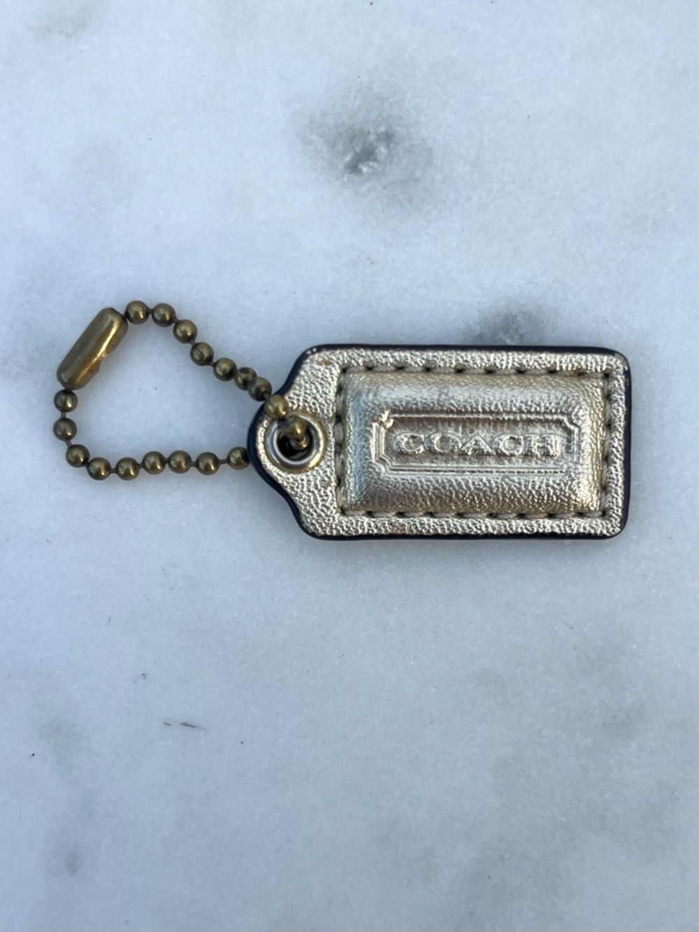 COACH Vintage Metallic Leather Hang Tag, Gold Mini